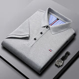Polo brodé respirant pour homme