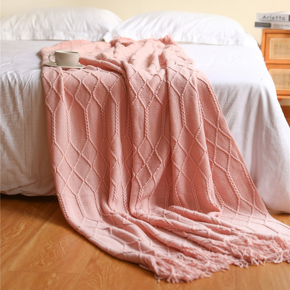 Plaid tricoté à franges